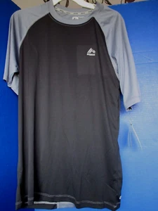 CAMISA DEPORTIVA RBX ~ Gris y Negra que absorbe la humedad ~ Resistente a la decoloración ~ Para hombre Mediana ~ Nueva con etiquetas - Imagen 1 de 3