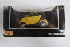 Maisto Smart Car Motorized 1:33 scale die cast model YELLOW With Box Pull Back - Picture 1 of 6