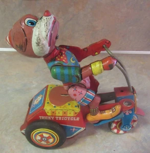 VINTAGE YONEZAWA JAPAN TIN FRICTION TRICKY TRICYCLE WITH DOG - Picture 1 of 10