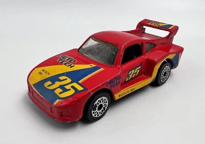 Matchbox ВИНТАЖНЫЙ 1983 СУПЕРБЫСТРЫЙ КРАСНЫЙ ГОНОЧНЫЙ PPORSCHE 935 AUTO TECH 1:64 МАКАО - Изображение 1 из 4