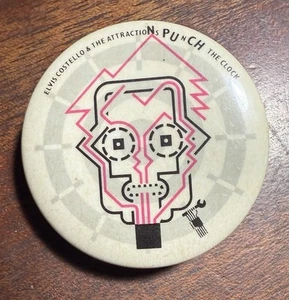 VINTAGE 1983 ELVIS COSTELLO & THE ATTRACTIONS PUNCH THE CLOCK PIN BACK BUTTON - Picture 1 of 2