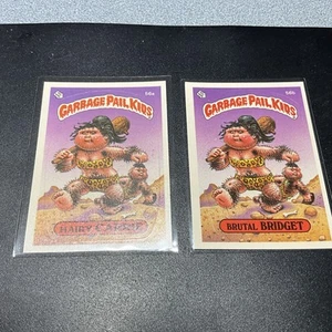 1985 Series 2 GPK Garbage Pail Kids  OS2 56a HAIRY CARRIE  56b BRUTAL BRIDGE - Picture 1 of 4