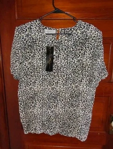 Neu mit Etikett Gr. XL 100 % Seide Leopardenmuster Bluse Tier Büro neu aus altem Lagerbestand Kurzarm - Bild 1 von 5