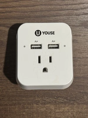 USB y toma de corriente Youse con soporte de acoplamiento para teléfono  Foto 1 de 3