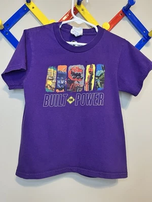 Camiseta Gráfica Juvenil 5/6 XS Dinotrux Púrpura Universal Dreamworks Netflix Usada en Excelente Condición Foto 1 de 4