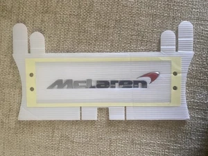 NEW GENUINE MCLAREN MP4 570S 650S 675LT 720S 750S REAR BUMPER RED BADGE EMBLEM - Picture 1 of 11