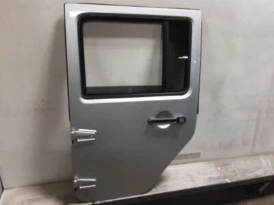 Jeep JK Wrangler OEM conductor puerta trasera potencia PS2 plata brillante 2007-2010 111006 Foto 1 de 4