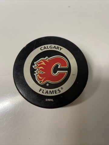 Calgary Flames NHL Official Game Hockey Puck Orange Ring Reverse Cover