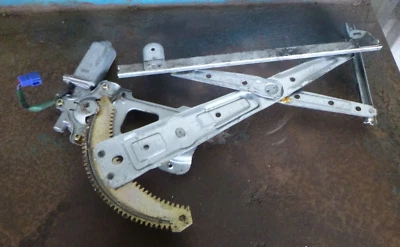 Regulador de ventana eléctrico delantero izquierdo con motor Subaru Forester SF 97-12/99 Foto 1 de 2