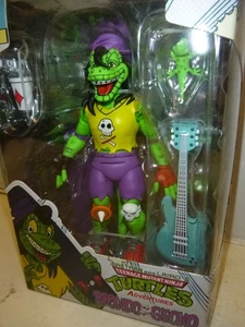 NEU Mondo Gecko (MISB) TMNT Eastman & Laird's Teenage Mutant Ninja (2023) NECA - Bild 1 von 3