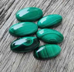 Malachite naturale lunga forma ovale cabochon qualità AAA fondo piatto pietre preziose - Foto 1 di 10