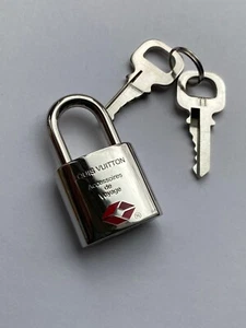 Louis Vuitton Schloss TSA / SILBER / AUT - Bild 1 von 8