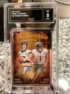 2024 Panini Phoenix - Treasured Tandems Trevor Lawrence, Travis Etienne #TT-JAX - Bild 1 von 8