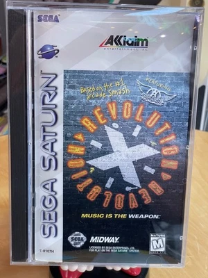 Revolution X [Sega Saturn] – Complete in Box (CIB) - Image 1 of 2