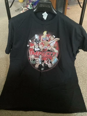 Camiseta de Lucha Libre IMPACT 2XL TNA Collage Exclusiva Caja de Lucha Libre Profesional  Foto 1 de 2