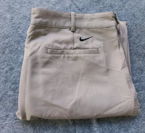 Pantalones de golf Nike para hombre talla 36 x 32 tostados Dri-Fit rendimiento poliéster frente plano - Imagen 1 de 7
