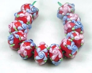 8 cuentas rondelle de vidrio murano hechas a mano "Flor de rosa primrosa" rosa azul sobre rojo - Imagen 1 de 3