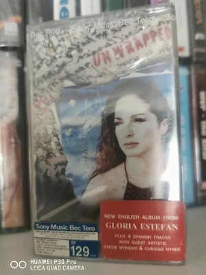 Gloria Estefan Unwrapped FACTORY SEALED CASSETTE ALBUM - Image 1 of 4