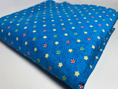 Andover Fabrics Patt 1193; Blue w/red, green, yellow stars fabric - Image 1 of 4
