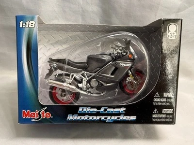 Novo na caixa Maisto Ducati ST4S Touring motocicleta de metal fundido cinza escala 1:18  - Imagem 1 de 4