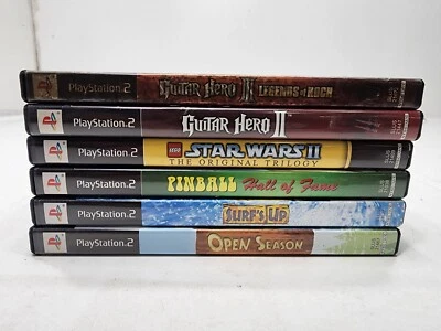 Lote de 6 Juegos Playstation 2 Guitar Hero 2 y 3 Star Wars 2 Surfs Up Temporada Abierta  Foto 1 de 4