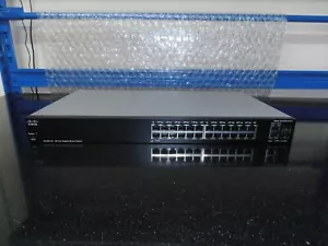 Cisco SG200-26 26 Gigabit Smart Switch with 2 Combo Ports. - Picture 1 of 4