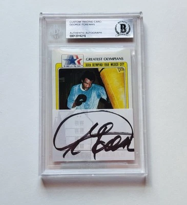 1983 GEORGE FOREMAN BECKETT Signed/Autograph/Cut Auto Topps Olympics Boxing Card - Image 1 of 4
