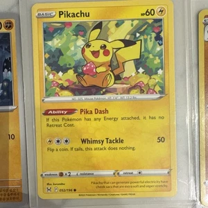Pikachu Promo plus 11 weitere Bonuskarten Holo Machamp - Bild 1 von 11