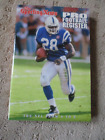 1995 Sporting News Pro Football Register with Marshall Faulk Troy Aikman *