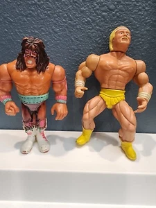 2 WWE Action FIGURES Hulk Hogan Ultimate Warrior Wrestling - Picture 1 of 1