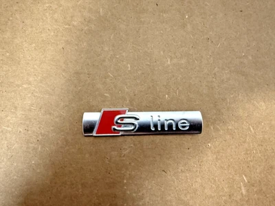 OEM Audi S Line A3 A4 A6 A7 RS7 S3 S4 S6 S7 SQ5 TT Fender Logo Emblem - Image 1 of 4