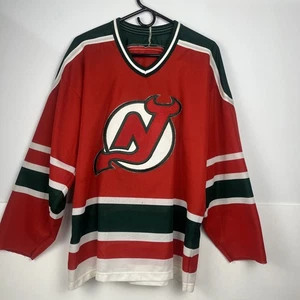 Camiseta deportiva de hockey vintage New Jersey Devils CCM Maska tejida al aire NHL roja verde para hombre XL - Imagen 1 de 10