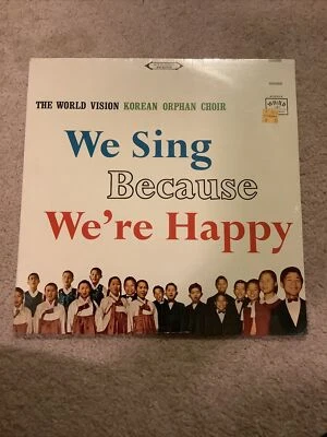 New We Sing Because We’re Happy Record Album - Image 1 of 4