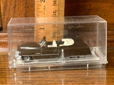 Vehículo Cadillac negro praliné escala 1/87 hecho en W. Alemania Foto 1 de 4