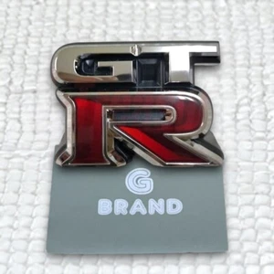 Genuine OEM Nissan 10-22 GT-R R35 Front Grill GTR Emblem Badge 62892-JF60A - Bild 1 von 1