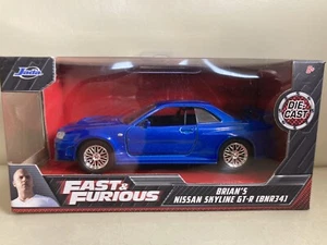 Jada Fast and Furious 1/32 scale Brian's Nissan Skyline GTR R34 + opening doors - Picture 1 of 7