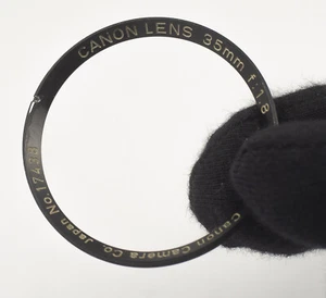 CANON F/1.8 35mm m39 LENS PART - FRONT RING WITH LOGO INSCRIPTION FOR REPAIR - Picture 1 of 2