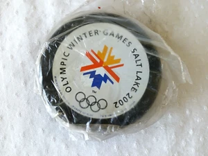 2002 Salt Lake City Olympic Winter Games Ice Hockey Souvenir Puck-Original Wrap - Picture 1 of 3
