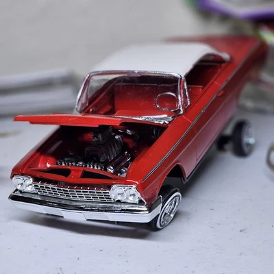 Tolva de brazo en A Bel-Air 62 Lowroder Foto 1 de 4