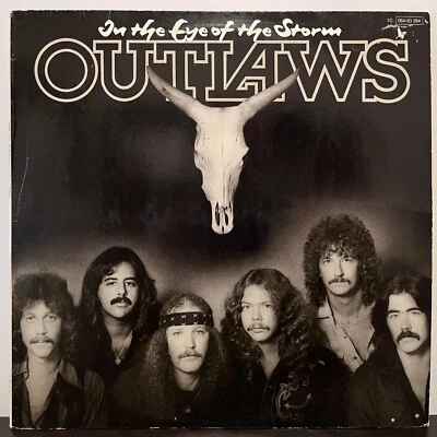 OUTLAWS - In The Eye Of The Storm (Germany Pressing) - 12" Vinyl Record LP - EX - Image 1 of 3