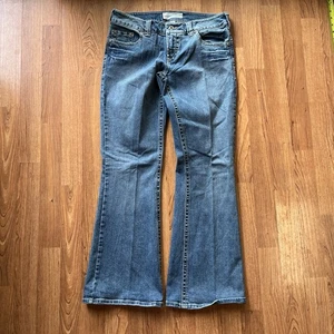 Jeans vintage anni 90 glam vita bassa svasati lavaggio leggero | taglia 3/4 corto - Foto 1 di 8