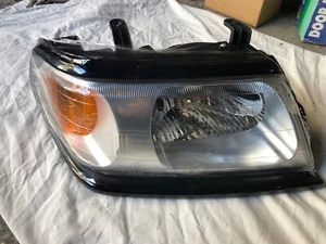 Proiettore sinistro per Mitsubishi Pajero Sport/Challenger dal 1997 al 2004 - Foto 1 di 3