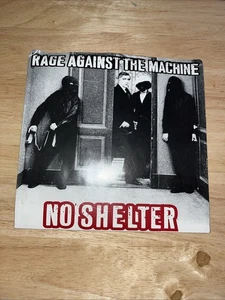 RAGE AGAINST THE MACHINE No Shelter / No Shelter 7" RED Vinyl 45 NEW ES7 41210 - Picture 1 of 3
