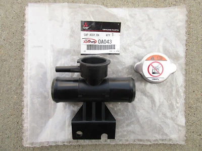 13 - 20 MITSUBISHI OUTLANDER SPORT RADIADOR TAPA FLUIDO CON SALIDA CUELLO OEM NUEVO Foto 1 de 3