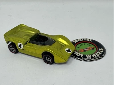 Hot Wheels Redline McLaren M6A Antifreeze 1968 W/ Button - Image 1 of 4