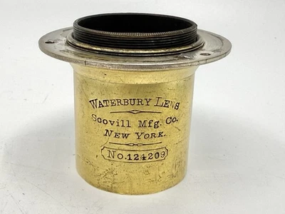 Lente Waterbury de latón de Scovill Mfg con topes Waterhouse. Vidrio limpio Foto 1 de 4