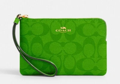 NUEVO CON ETIQUETAS COACH Muñequera Esquina Cremallera En Cuero Signature Verde Neón 91178 Nueva Con Etiqueta Foto 1 de 2