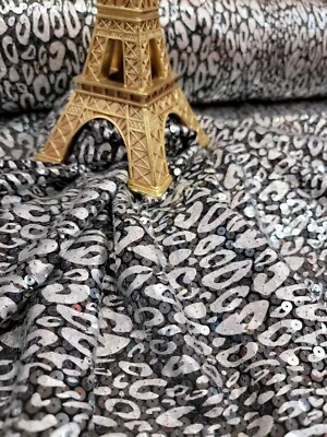 Tela metálica de spandex vendida por yarda patrón de guepardo lentejuelas transparentes sobre spandex Foto 1 de 4