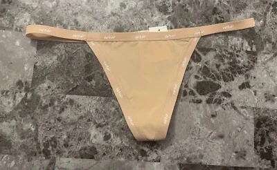 NWT AERIE AMERICAN EAGLE BEIGE NUDE SMOOTH THIN NYLON SPANDEX V STRING PANTIES - Image 1 of 3