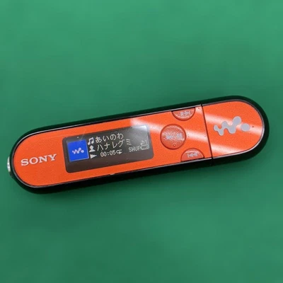 Reproductor de música digital Sony Walkman NW-E042 MP3 naranja 2 GB portátil probado Japón Foto 1 de 4